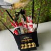 hot air ballon basket with chocolates.